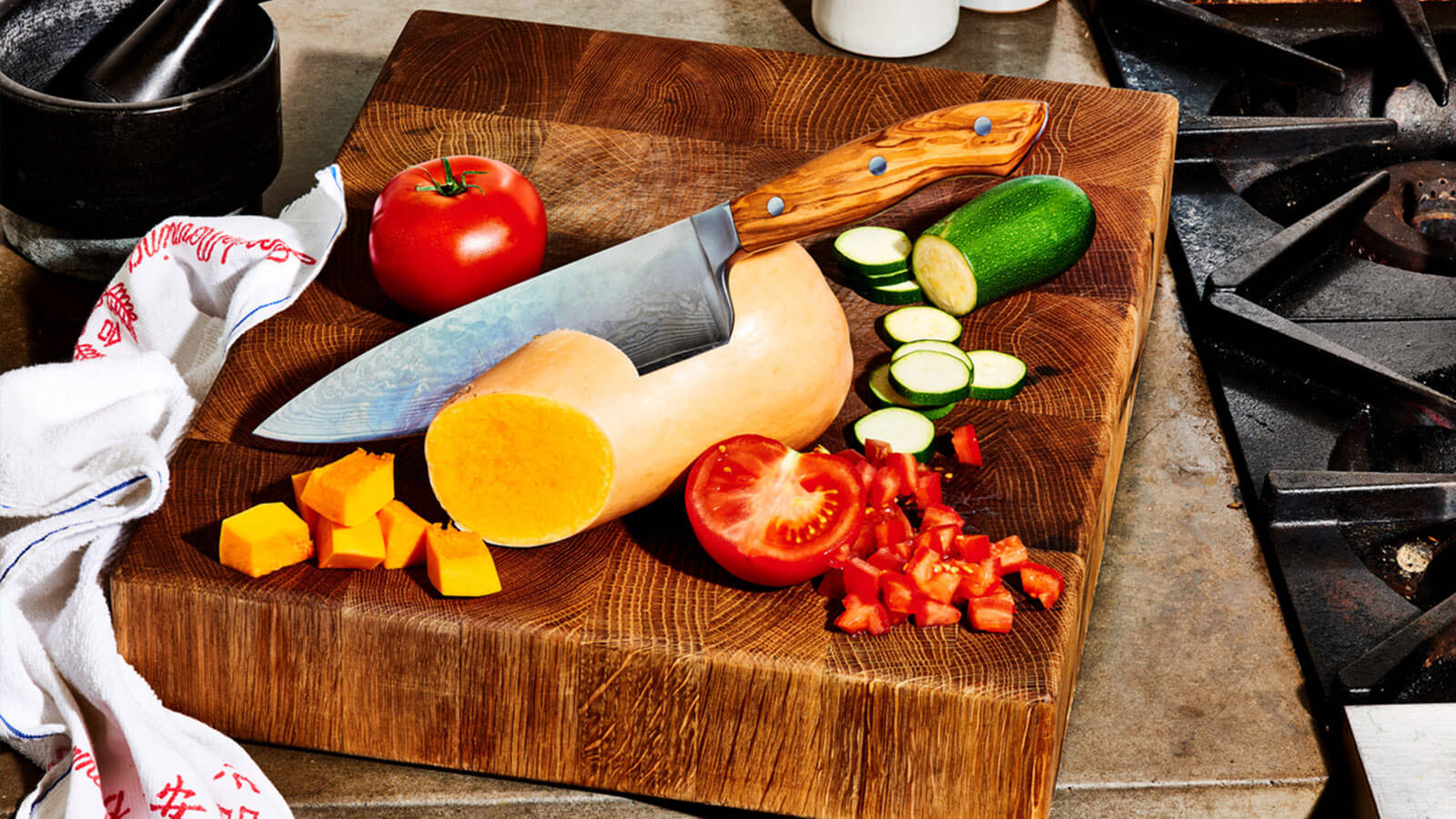 Image of vegetables and knife on chopping board