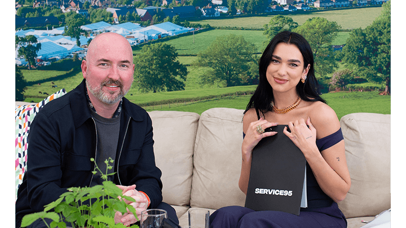 Dua Lipa and author Douglas Stuart at Hay Festival