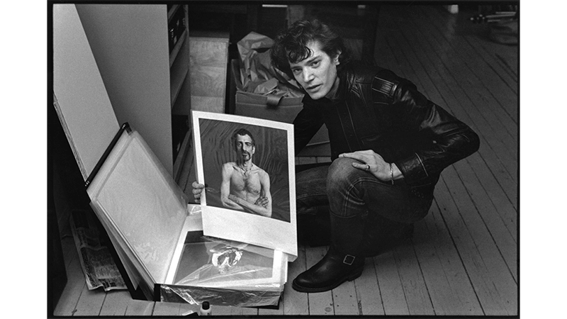 Photographer and artist Robert Mapplethorpe in his studio in New York in 1979